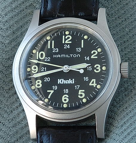 Модель Khaki с люминесцентными стрелками и цифрами. Бренд Hamilton Модель Khaki с люминесцентными стрелками и цифрами. Бренд Hamilton