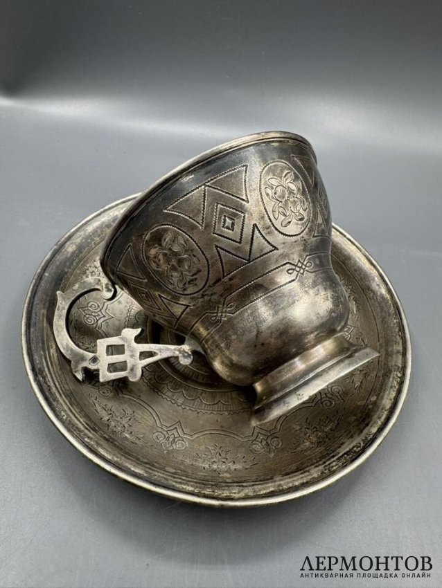 Чайная пара с цветочным декором. Серебро 84 пробы, Россия, 1865 и 1877 годы