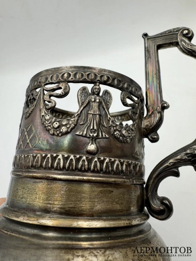 Подстаканник с ангелами и гирляндами. Серебро 84 пробы, А. Иванов, Россия, 1908–1917 годы