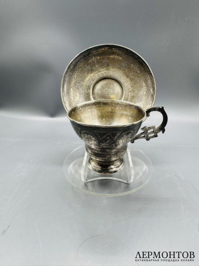 Чайная пара с цветочным декором. Серебро 84 пробы, Россия, 1865 и 1877 годы