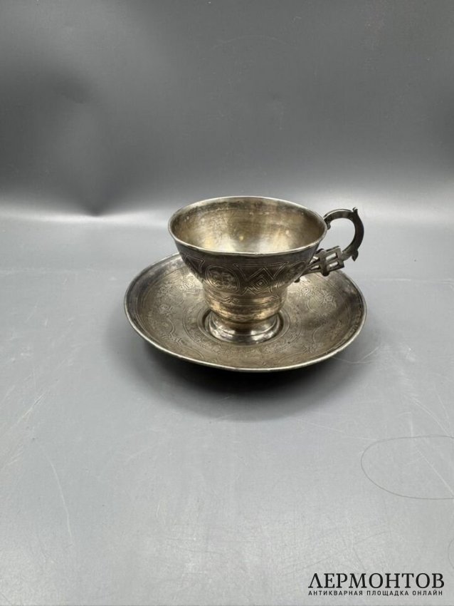 Чайная пара с цветочным декором. Серебро 84 пробы, Россия, 1865 и 1877 годы