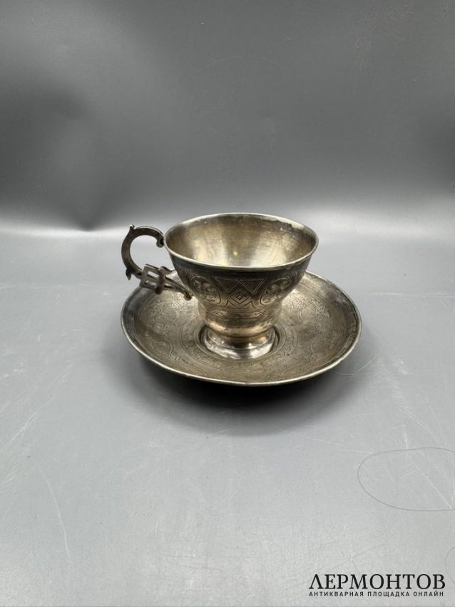 Чайная пара с цветочным декором. Серебро 84 пробы, Россия, 1865 и 1877 годы