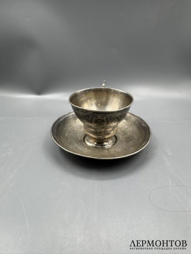 Чайная пара с цветочным декором. Серебро 84 пробы, Россия, 1865 и 1877 годы